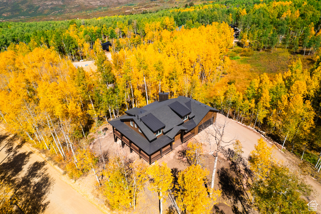 View from above of property featuring a forest