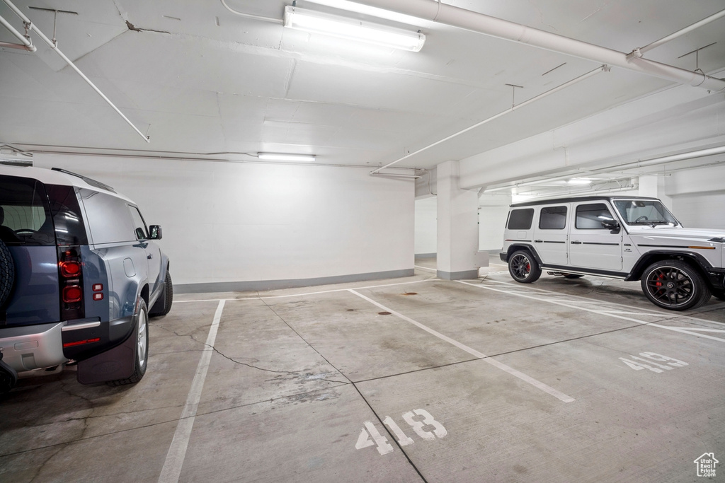 Parking garage featuring baseboards