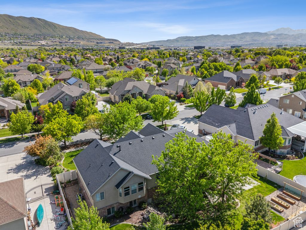 Aerial view of residential area with a mountain backdrop