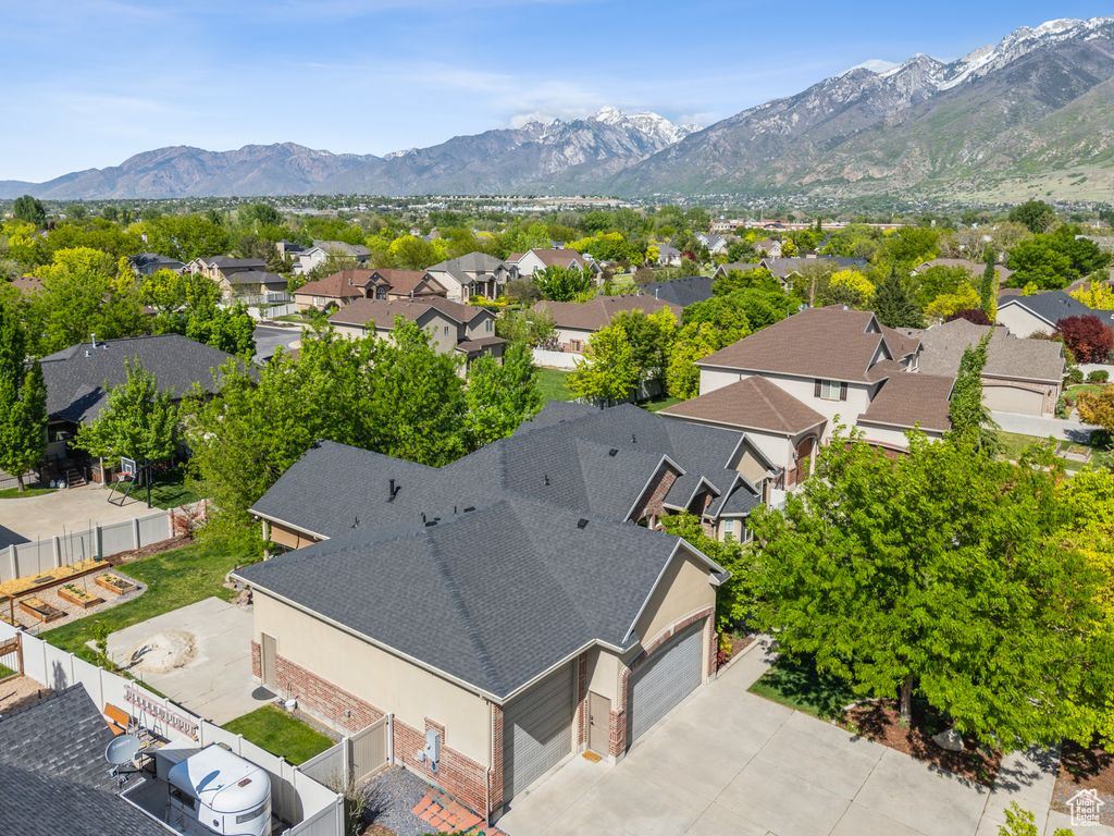 Aerial perspective of suburban area featuring mountains