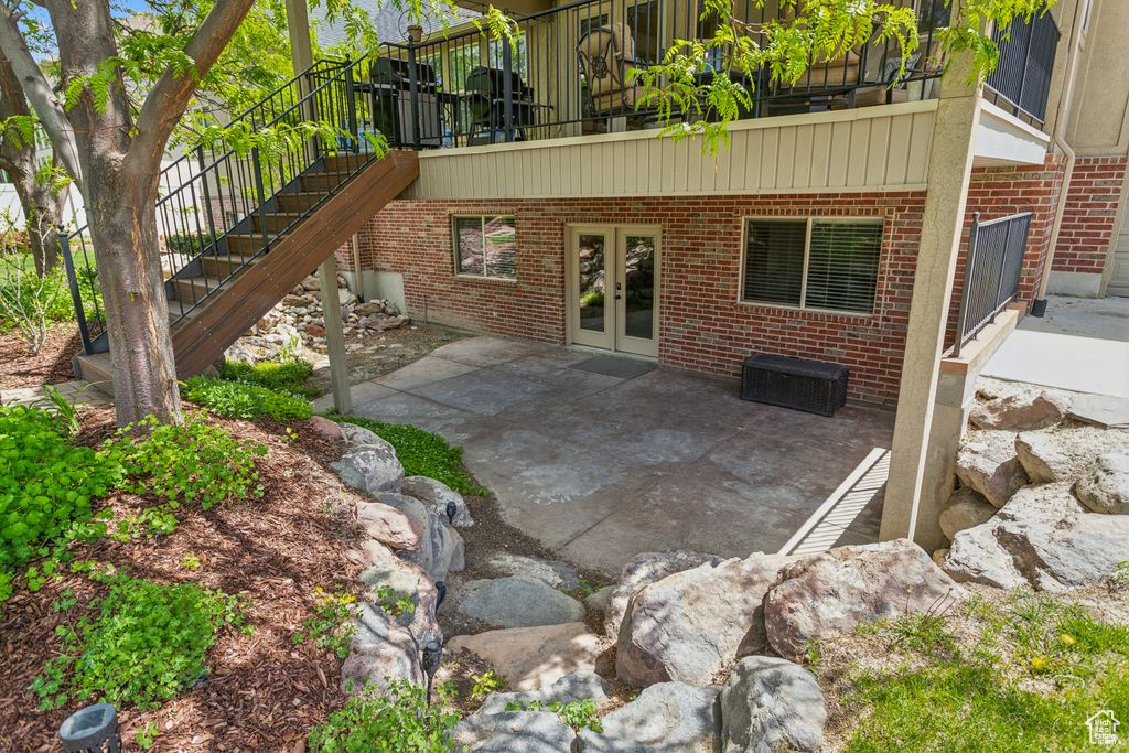 View of patio / terrace with french doors and stairway