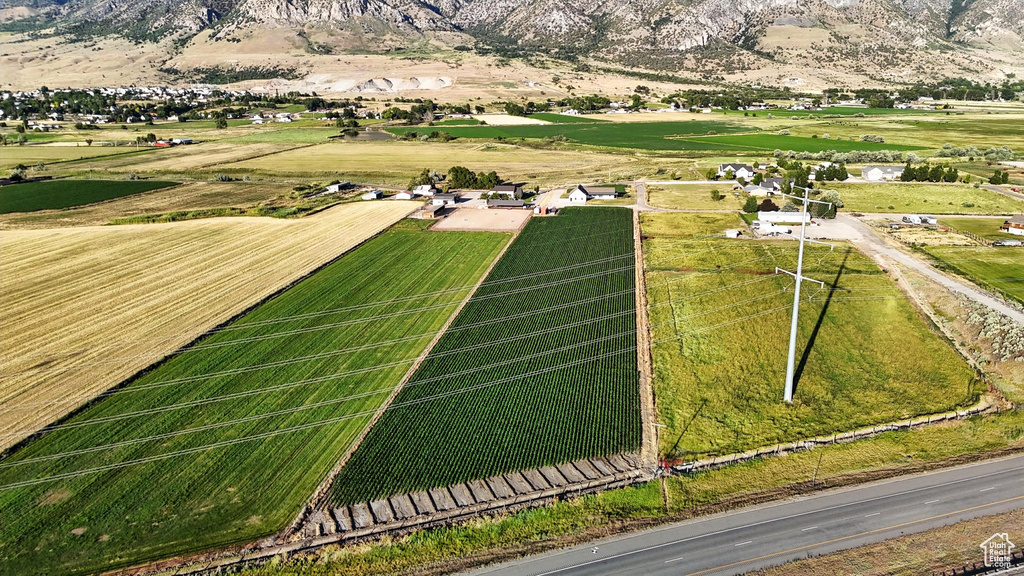 View of property location with rural landscape, mountains, and abundant farmland