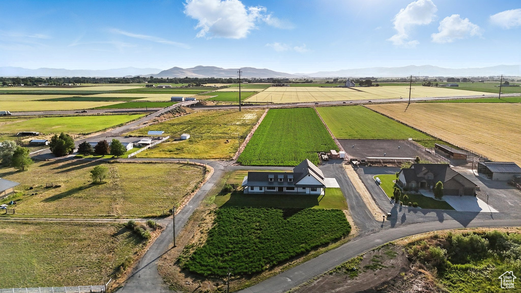 Overview of rural landscape with a mountain backdrop