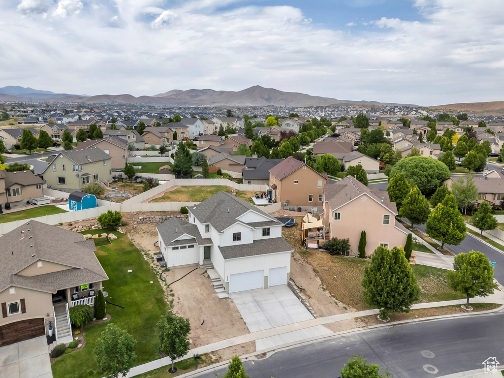 Aerial view of residential area with mountains