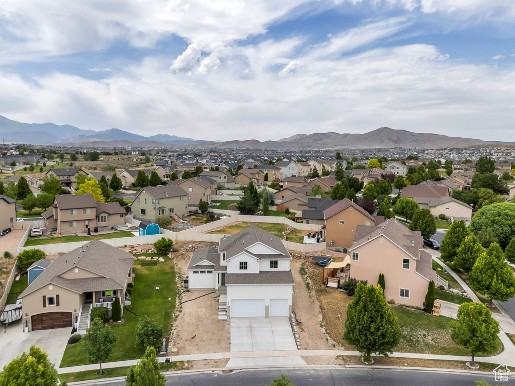 Aerial perspective of suburban area with mountains