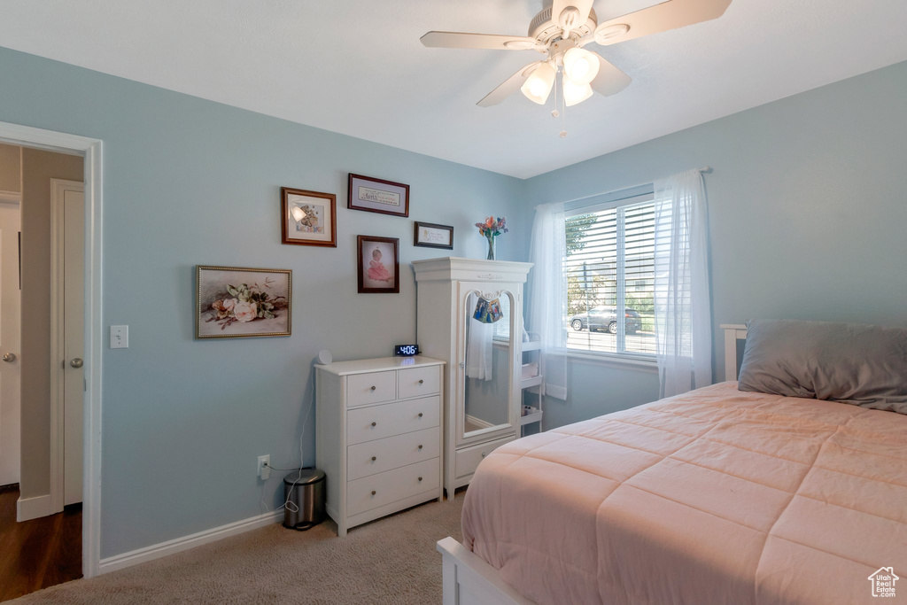 Bedroom featuring carpet flooring and a ceiling fan