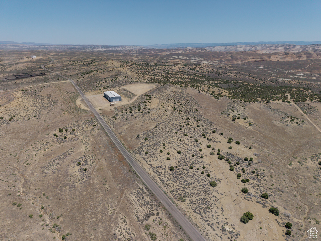 Aerial view of property's location with a desert landscape and rural landscape