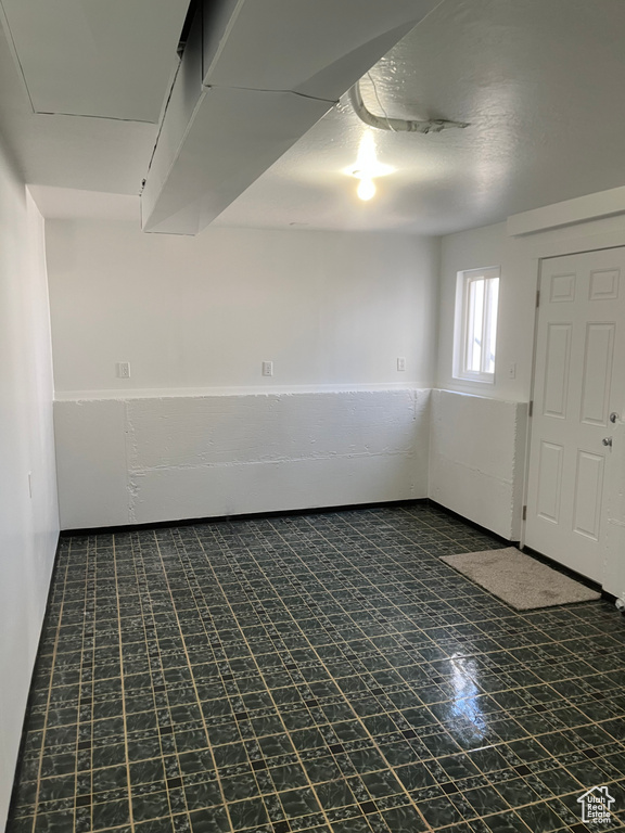 Empty room with tile patterned floors