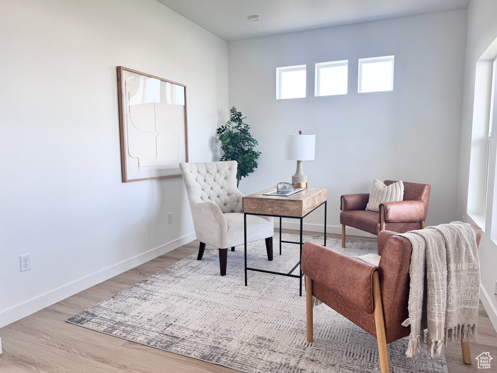 Home office featuring wood finished floors and baseboards