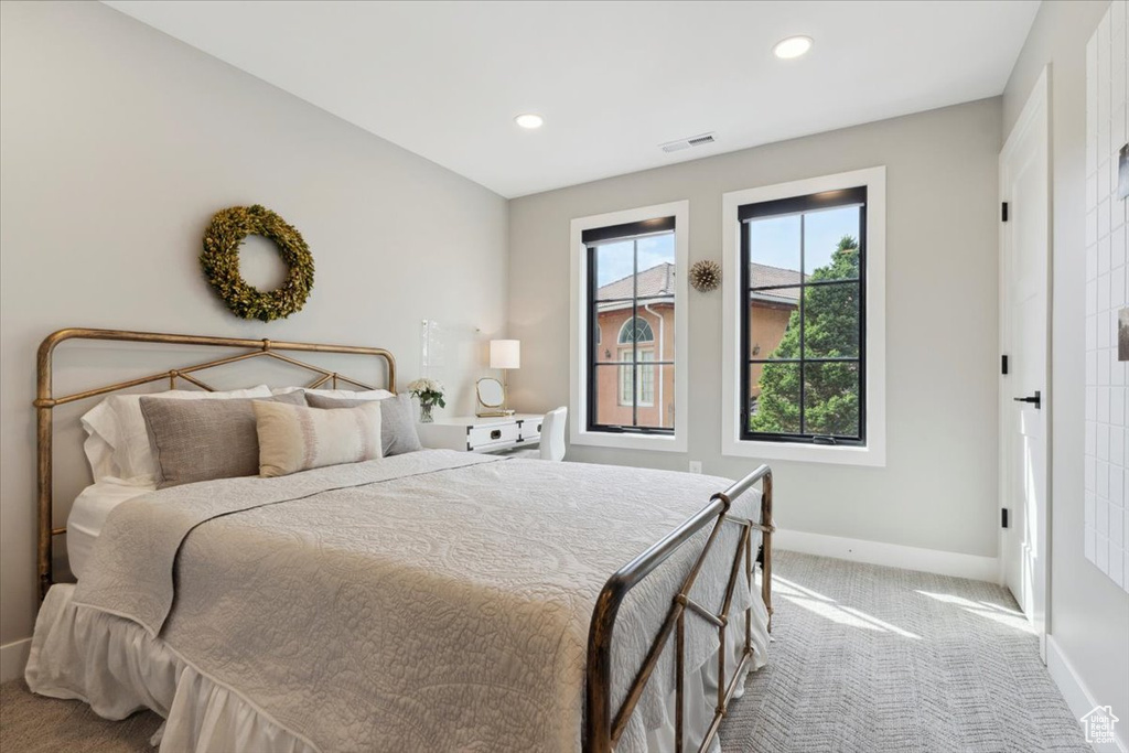 Bedroom featuring carpet flooring and recessed lighting