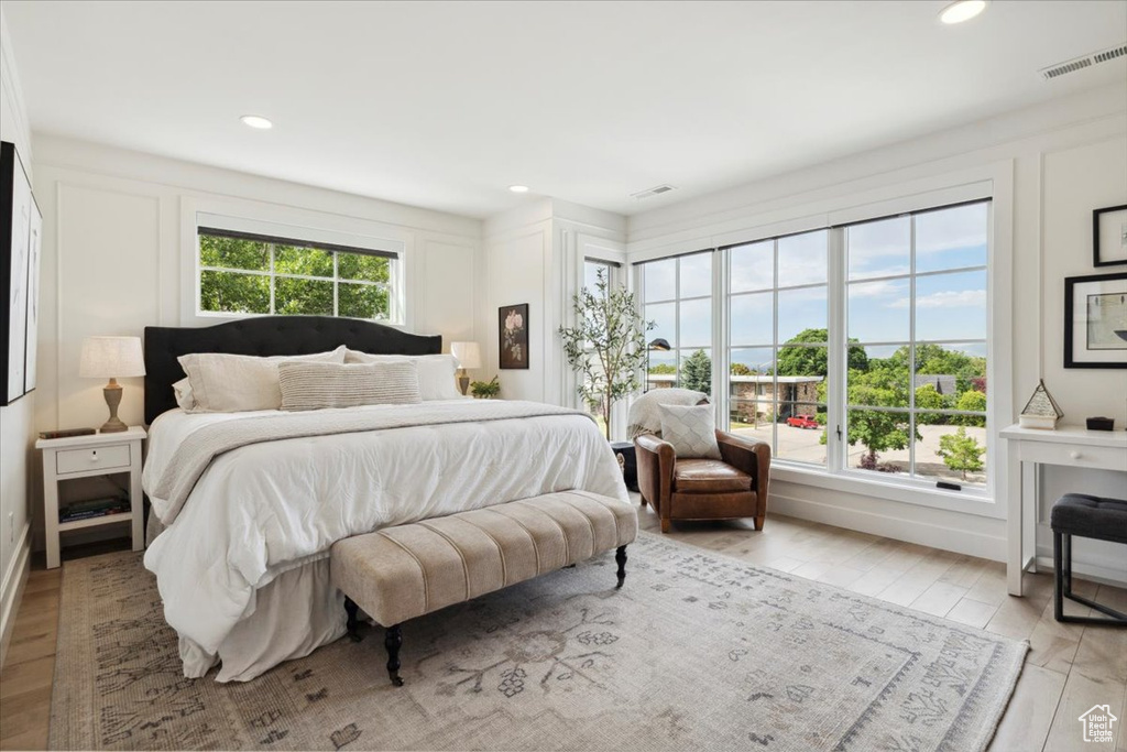 Bedroom featuring light wood-style flooring and recessed lighting