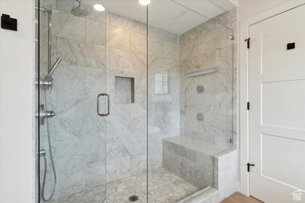 Full bath with a shower stall