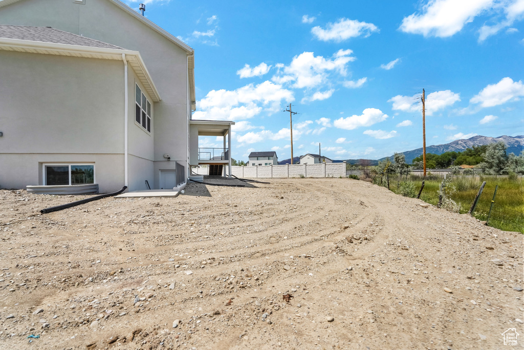 View of yard with a mountain view