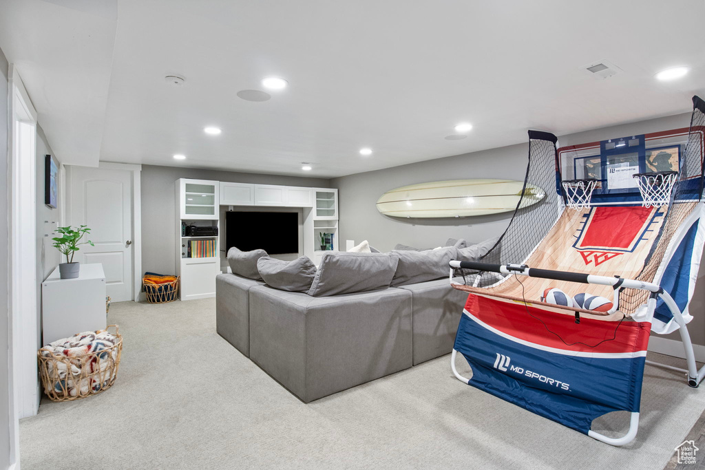 Living room featuring recessed lighting and carpet floors