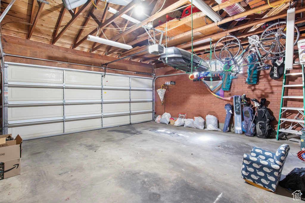 Garage featuring a garage door opener
