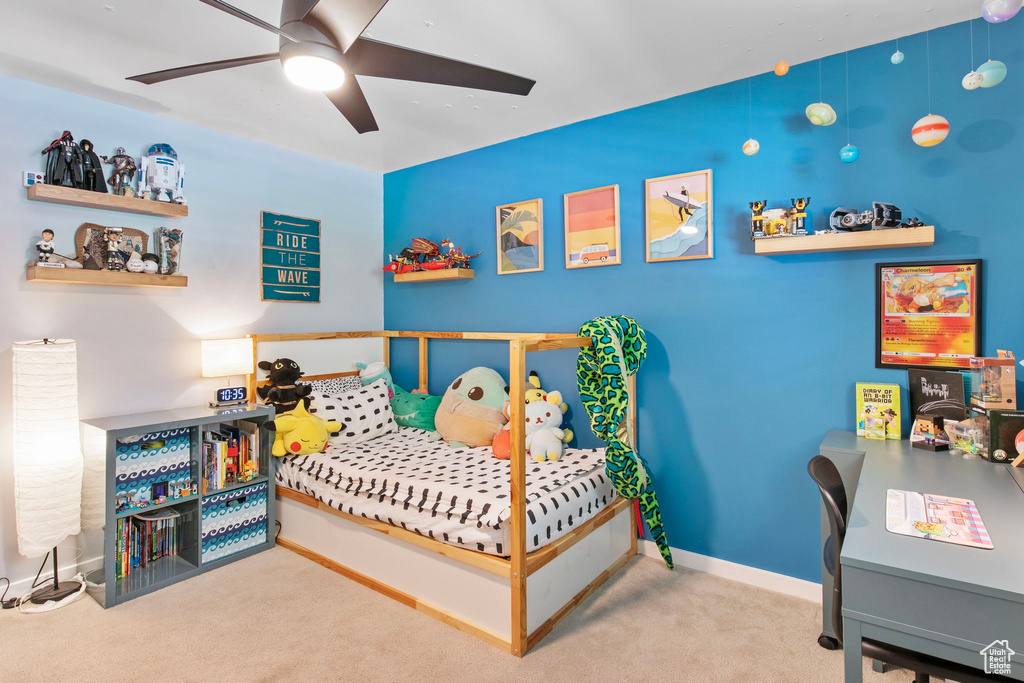 Carpeted bedroom with baseboards