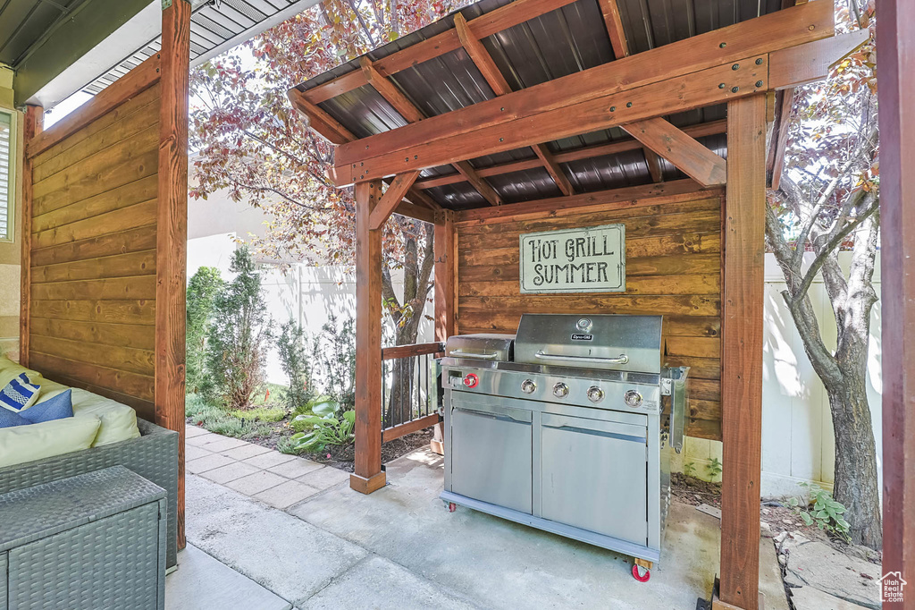 View of patio / terrace featuring a grill