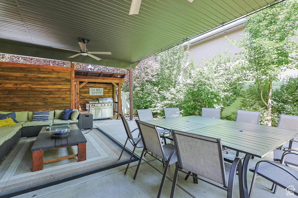 View of patio / terrace featuring ceiling fan, outdoor dining space, and outdoor lounge area