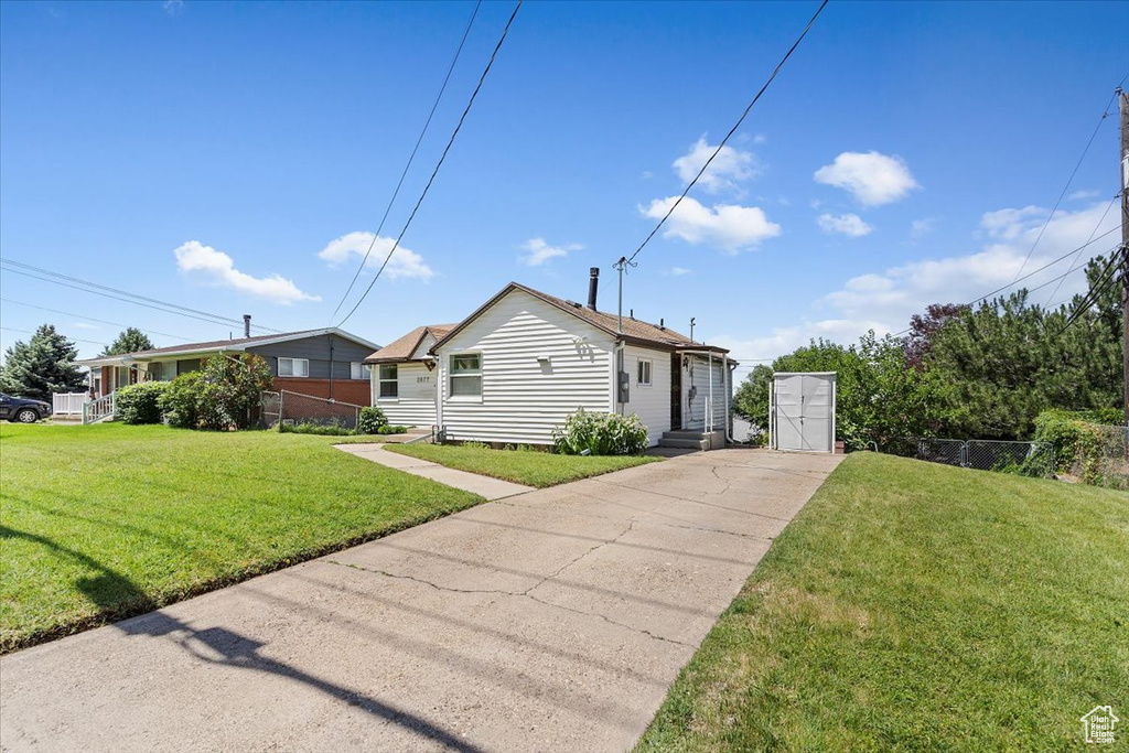 View of front of home featuring concrete driveway and entry steps