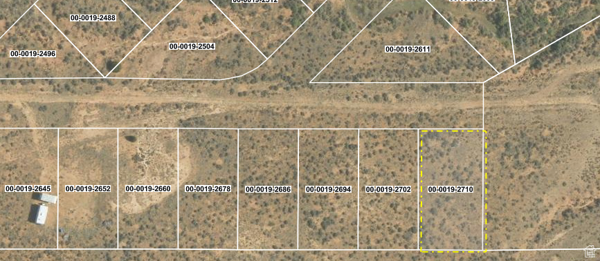 Aerial map of property and surrounding area with property parcel outlined