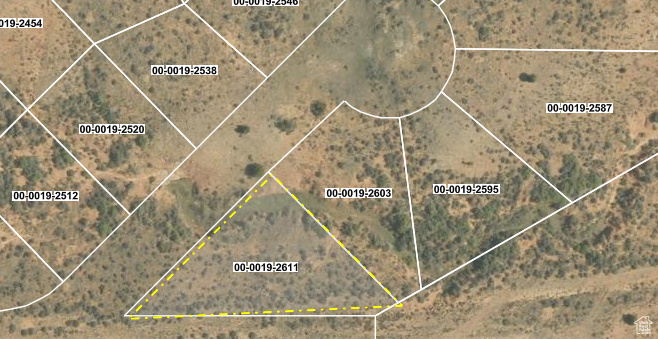 Aerial map of property and surrounding area with property parcel outlined
