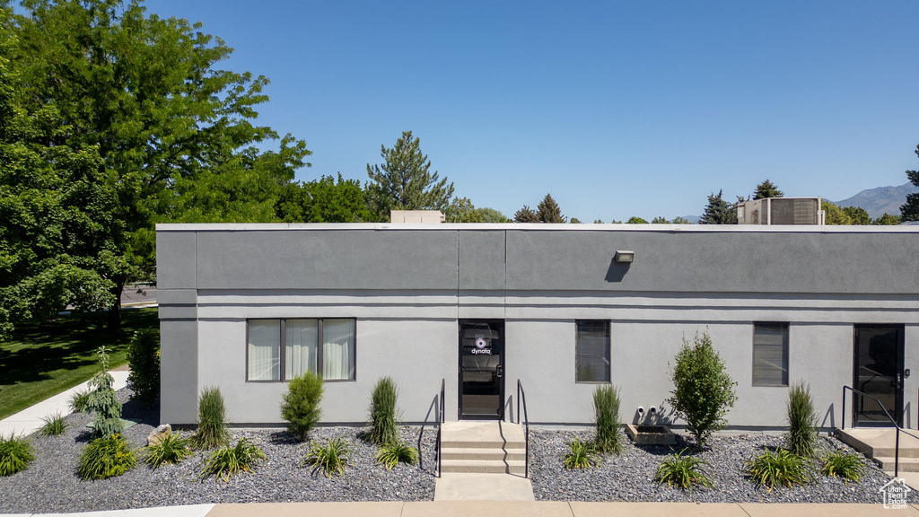 View of front facade with stucco siding
