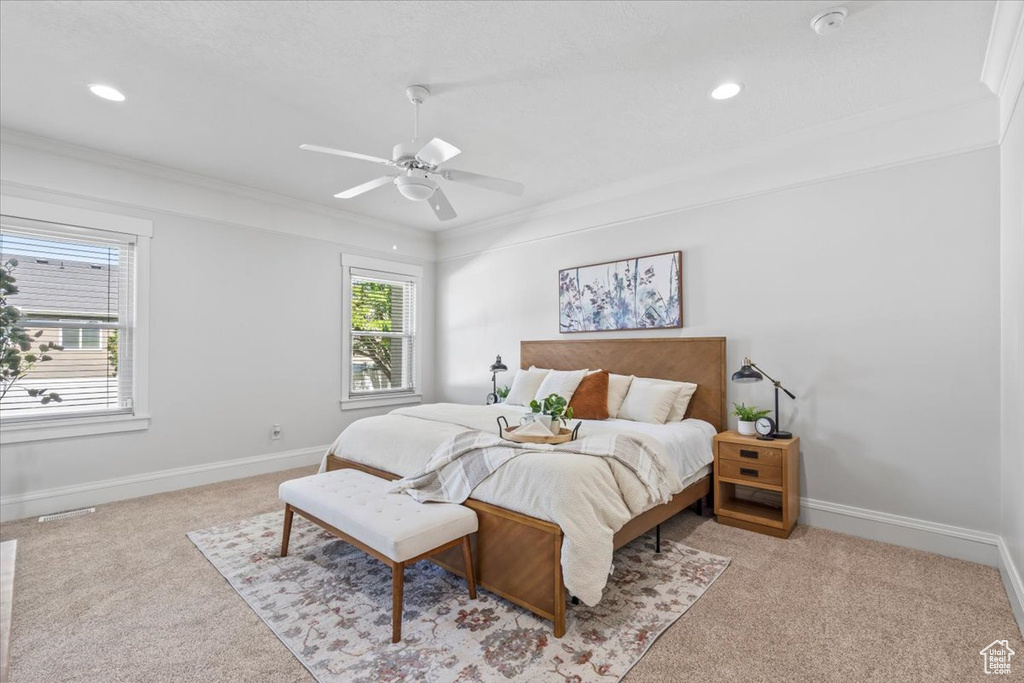 Bedroom featuring carpet flooring, recessed lighting, a ceiling fan, and ornamental molding