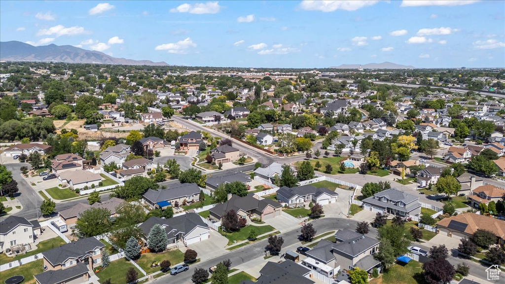 Aerial perspective of suburban area featuring mountains