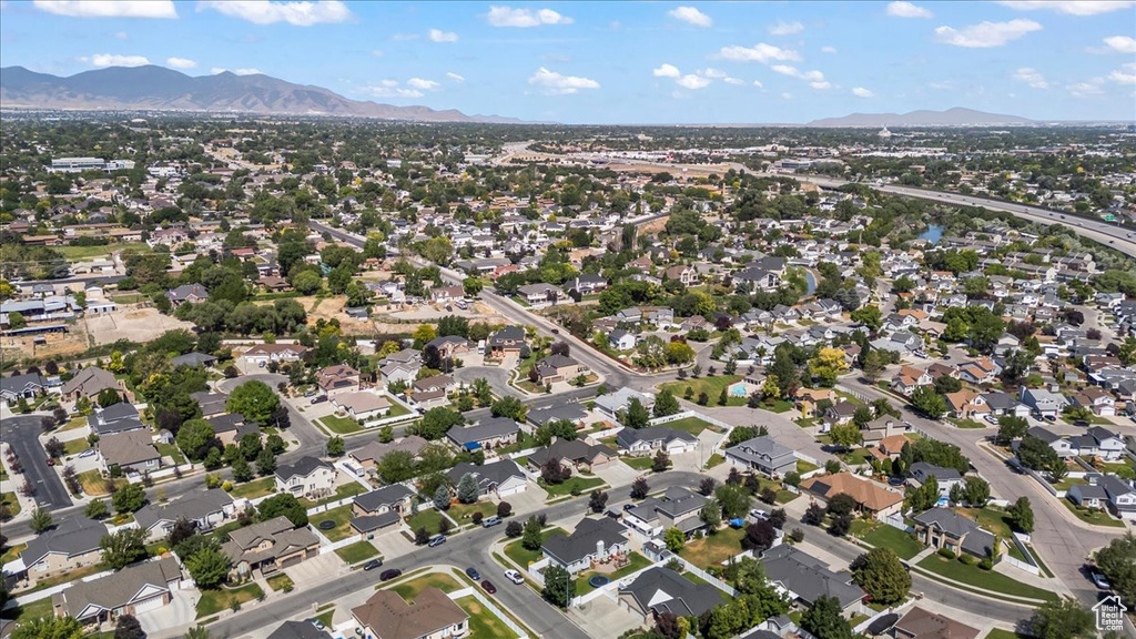 View of property location with a mountainous background and nearby suburban area
