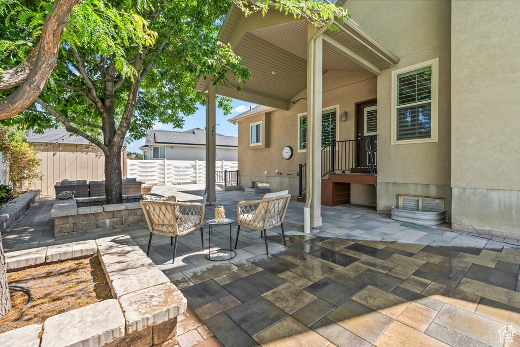 View of patio with an outdoor living space