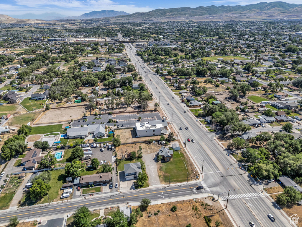 Aerial view of property\\\\\\\'s location featuring a major roadway and a mountainous background