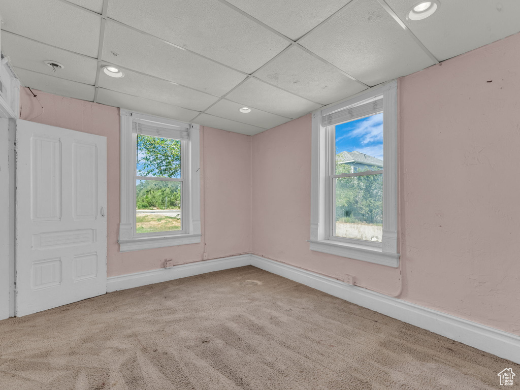 Carpeted spare room with recessed lighting and a paneled ceiling