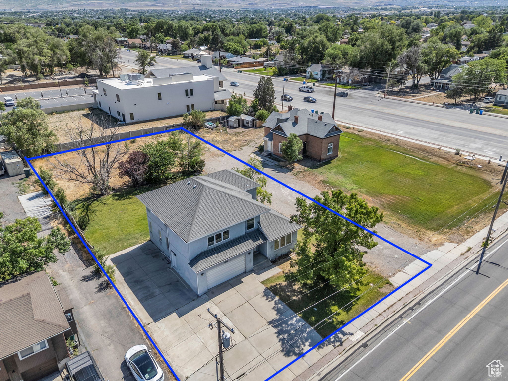 Aerial overview of property's location with property parcel outlined