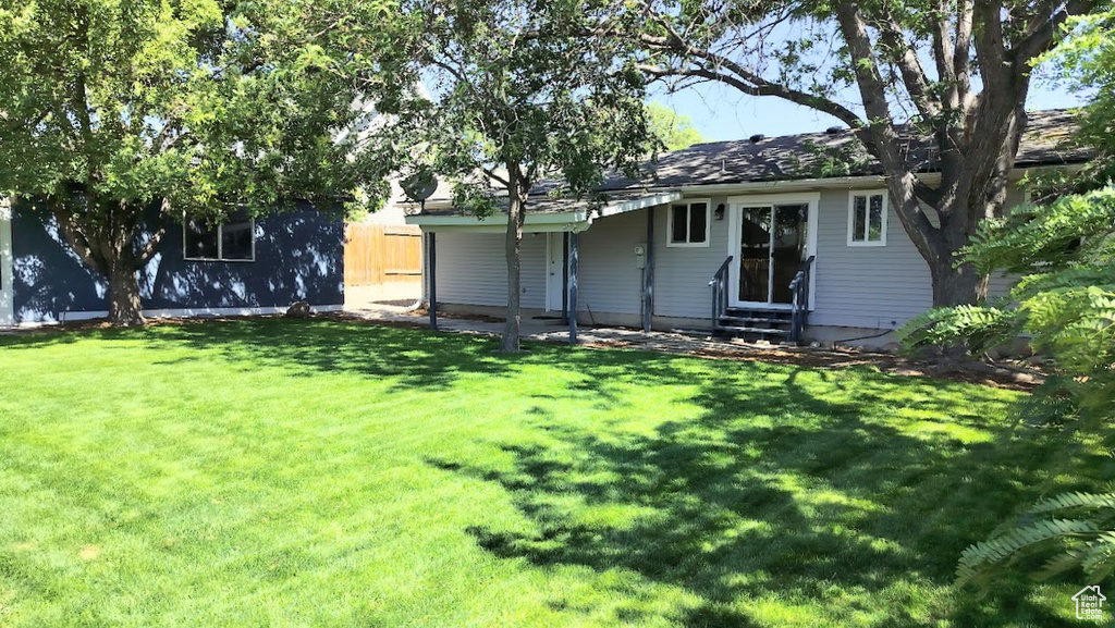 Back of property with entry steps