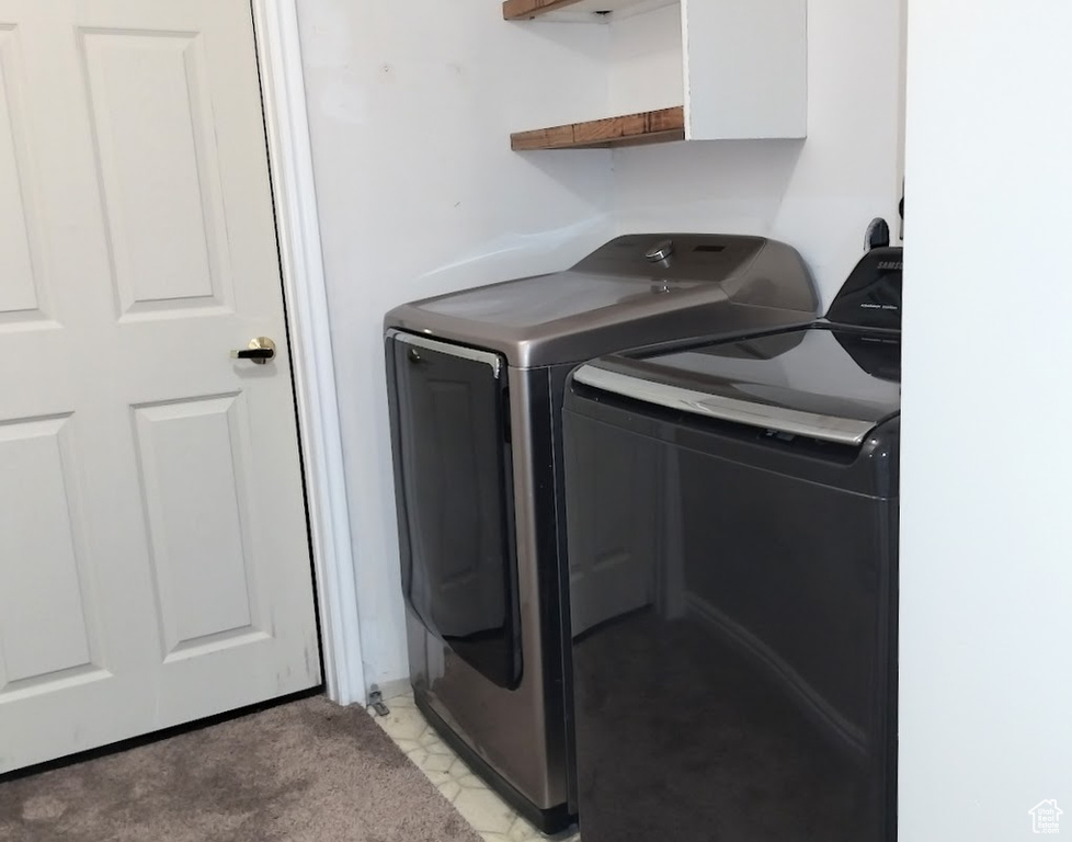 Laundry room featuring washer and dryer