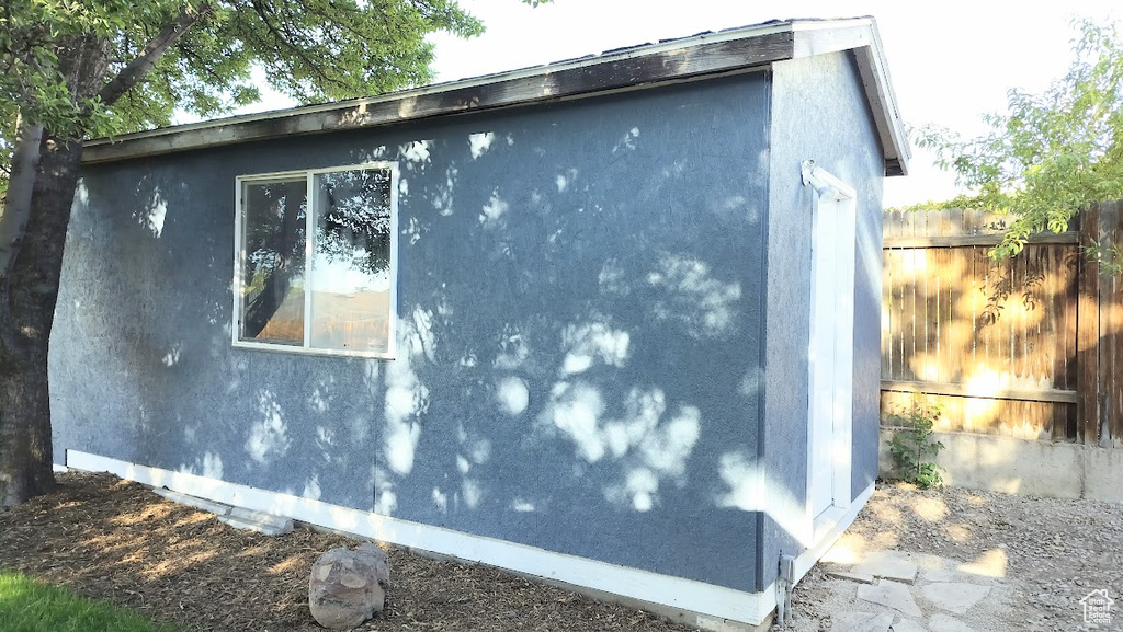 View of home\\\\\\\\\\\\\\\'s exterior featuring an outdoor structure and stucco siding