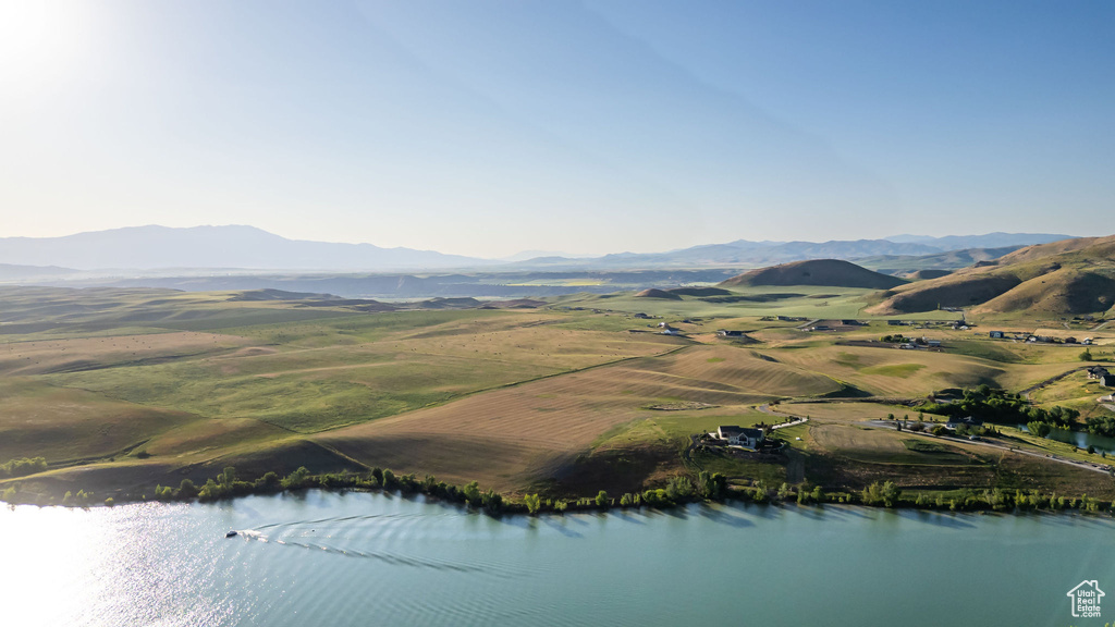 Aerial overview of property's location with a water and mountain view