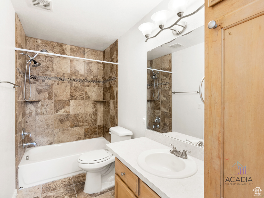 Full bathroom with vanity and shower / tub combination