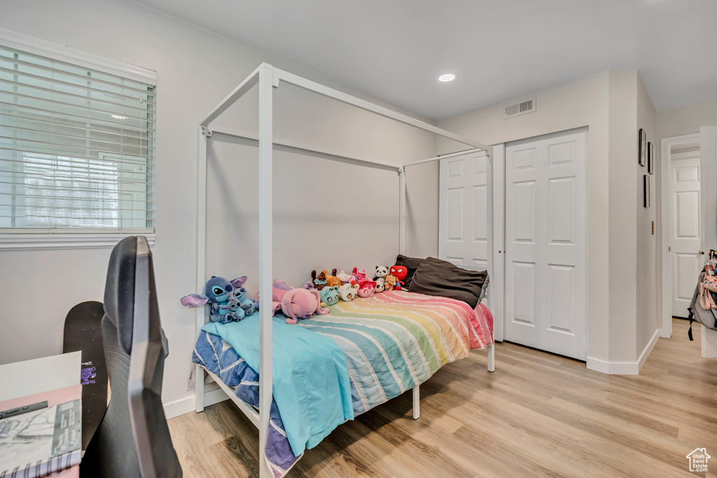 Bedroom featuring light wood-style flooring and recessed lighting