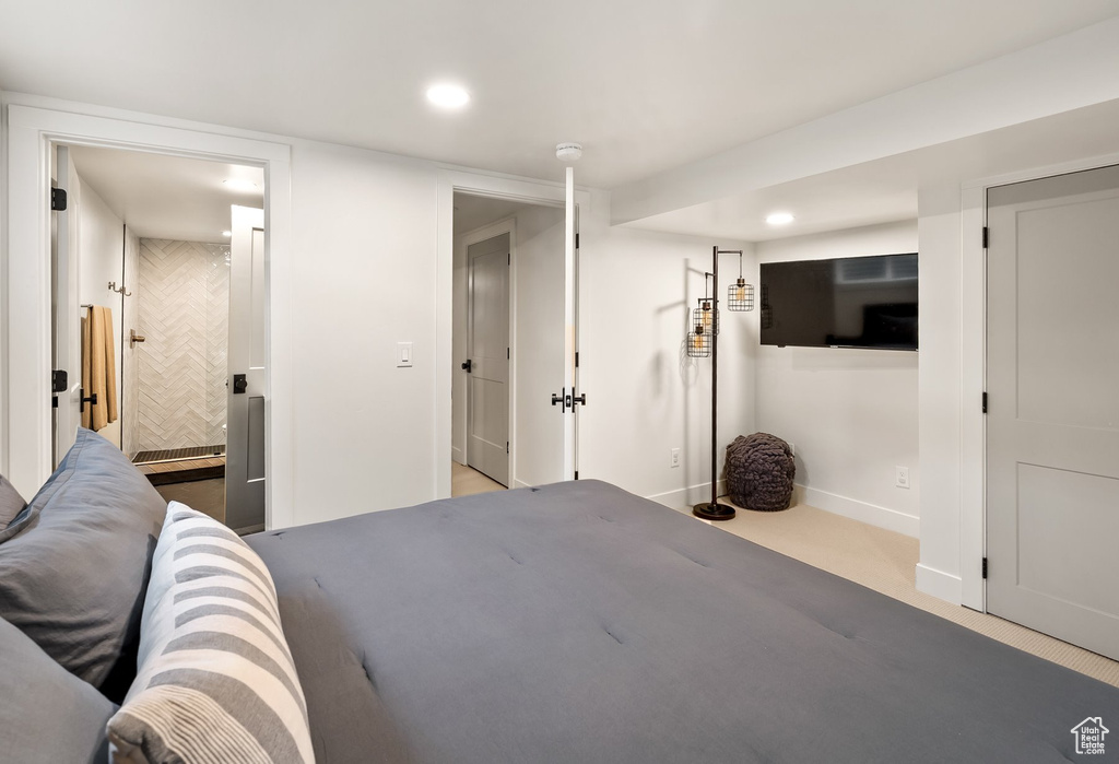 Bedroom with recessed lighting and ensuite bath