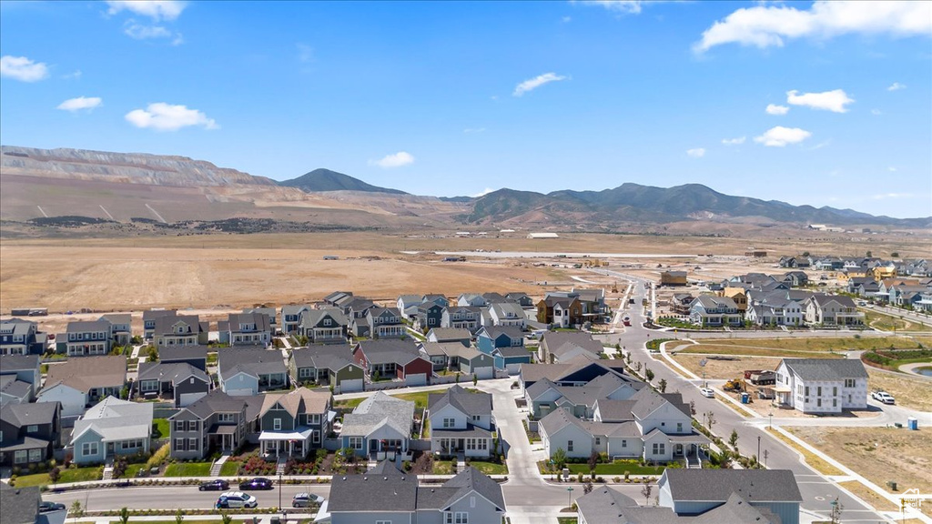 Aerial view of residential area with a mountainous background