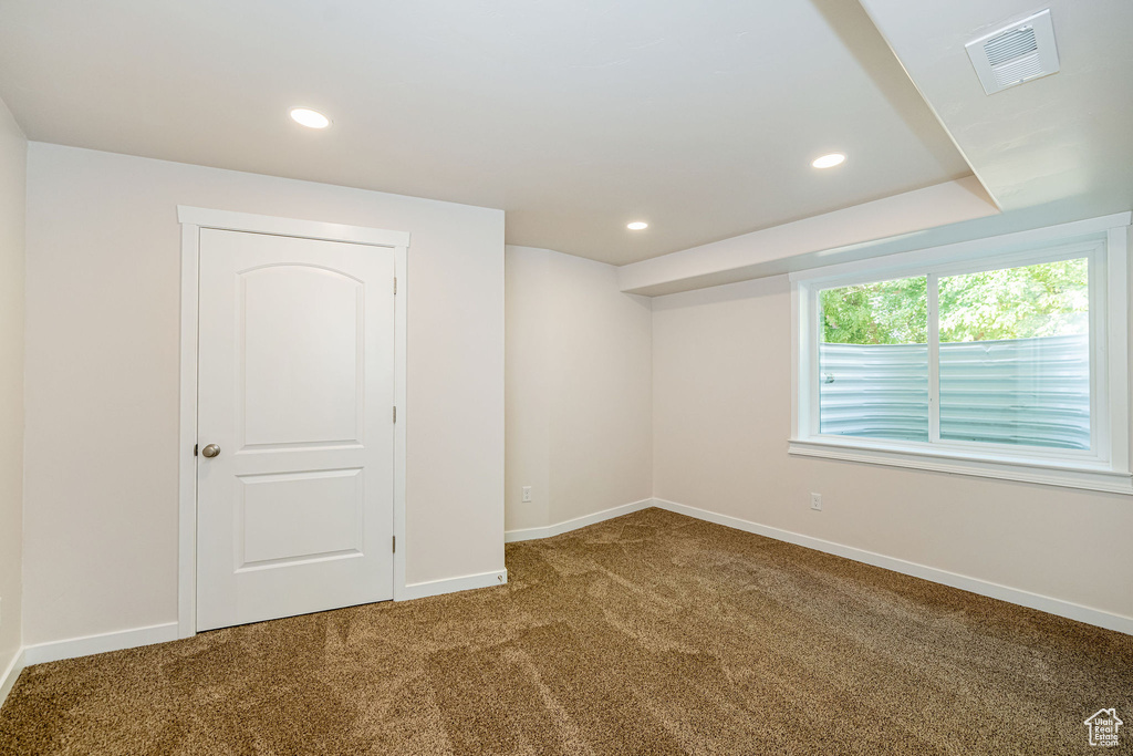 Spare room with carpet flooring and recessed lighting