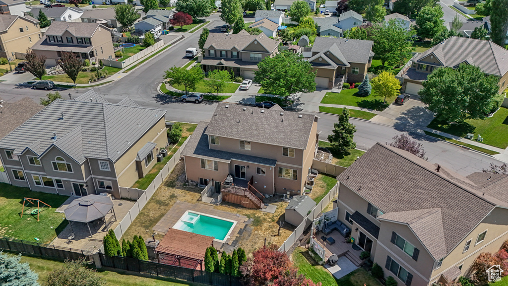 Aerial view of residential area with a pool