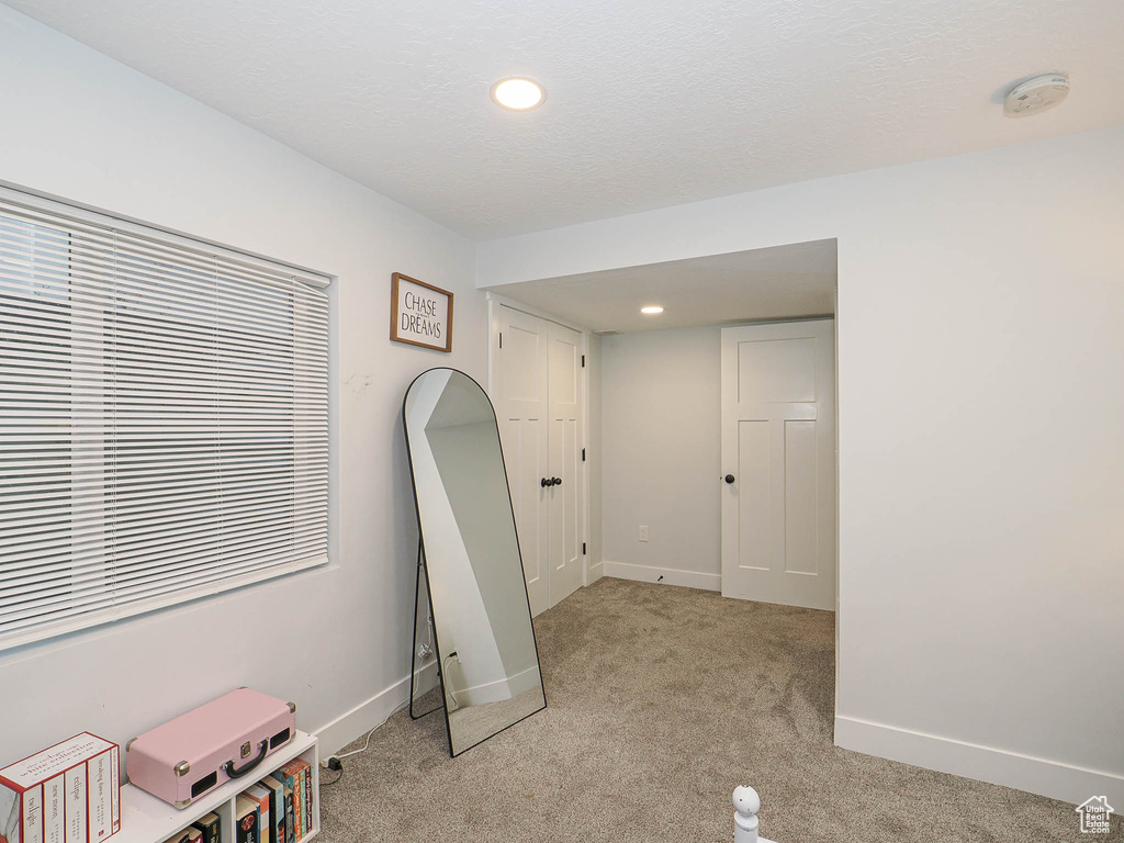 Playroom featuring light colored carpet and recessed lighting