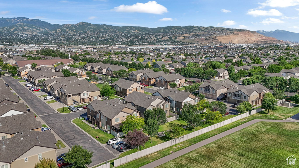 Aerial view of residential area with mountains