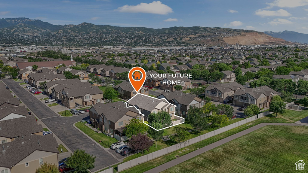 Aerial perspective of suburban area featuring mountains