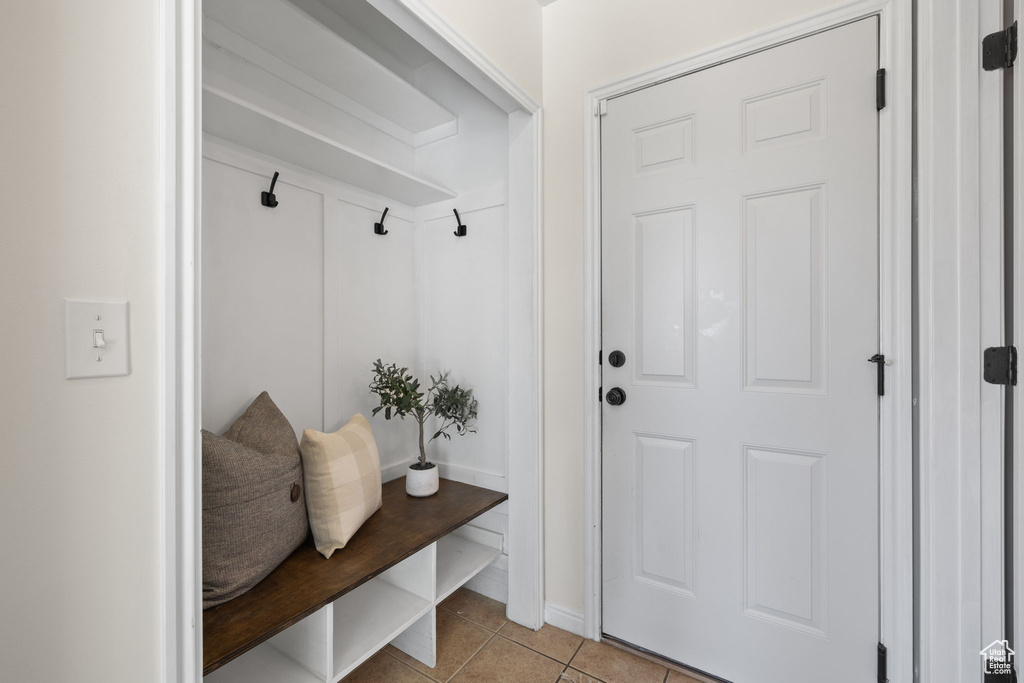 Mudroom featuring light tile patterned flooring