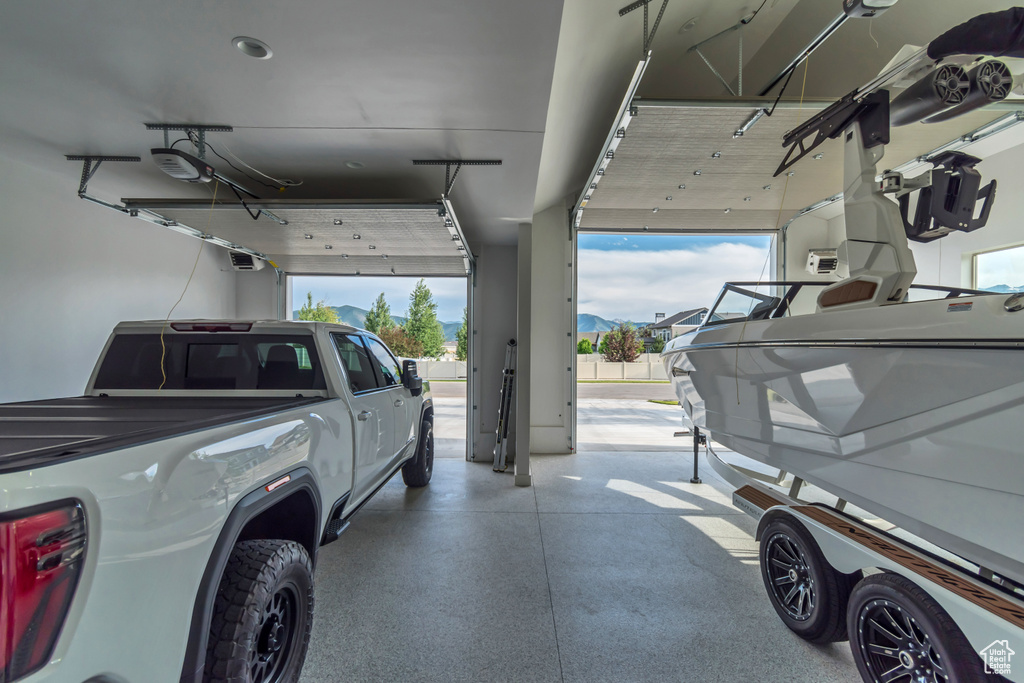 Garage featuring a garage door opener