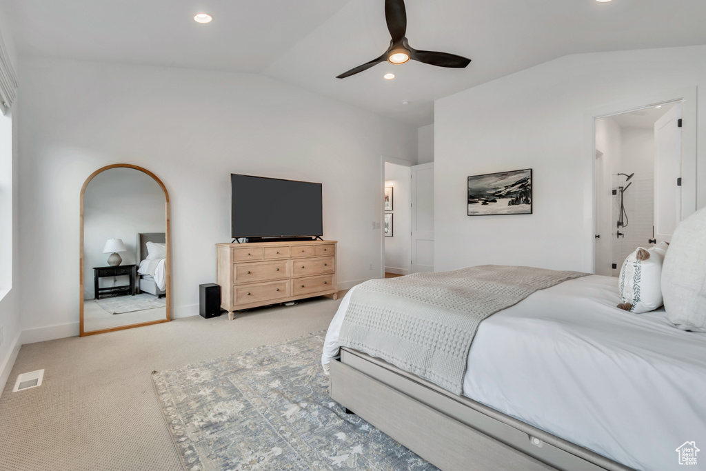 Bedroom with vaulted ceiling, carpet floors, ceiling fan, and recessed lighting