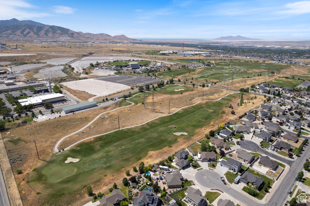 Aerial view of property\\\\\\\'s location featuring a mountain backdrop and nearby suburban area